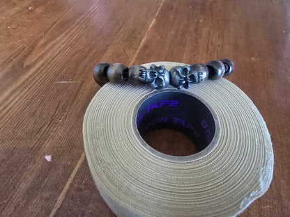 Whiskey barrel skulls bracelet