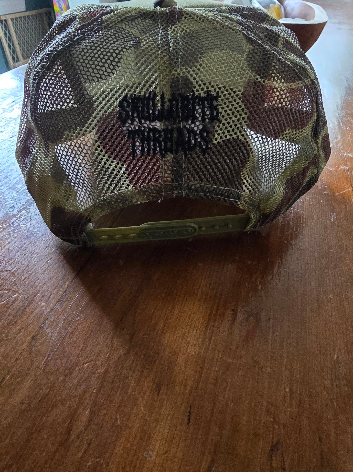 Skullobite threads moshing camo trucker hat
